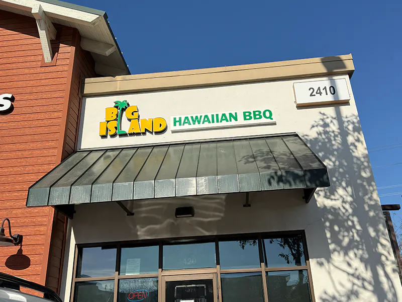 Modern storefront with Big Island BBQ signage at 2410 River Rd at Big Island BBQ, a Asian Restaurant in Norco